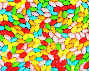 Fototapeta na wymiar Multicolored candies for use as background. Closeup.