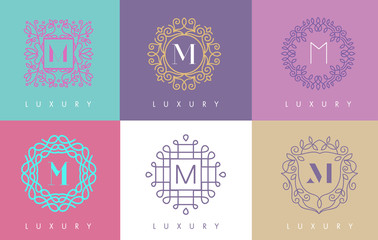 M Letter Pastel Floral Monogram Lines Logo Design.