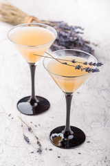 Two glasses with a cocktail martini