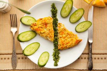 Healthy vegetarian breakfast with omelet made with vegetables and eggs, fresh orange juice. Fast cooking lunch with organic ingredients.