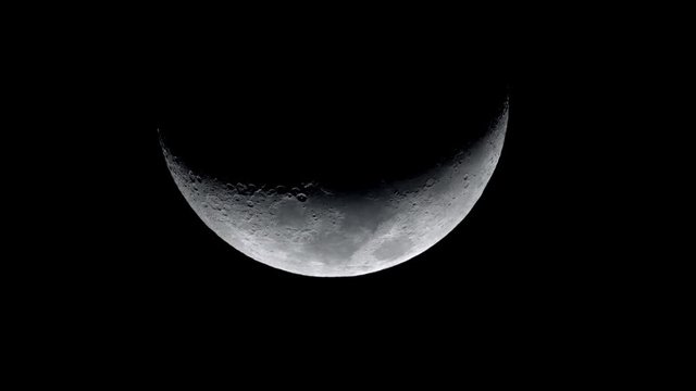 Footage of the half moon moves in the warm air flow.
Waxing Moon On Night Sky &nbsp; 



