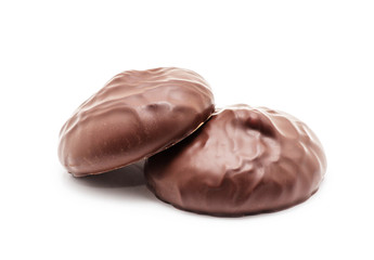 chocolate covered marshmallows on white background