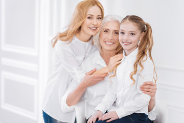 Fototapeta premium Three generations of the family resting together