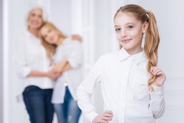 Fototapeta premium Positive little girl resting at home