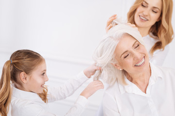 Fototapeta premium Positive family relaxing at home