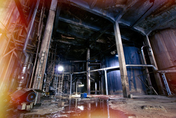 Old creepy, dark, decaying, destructive, dirty factory