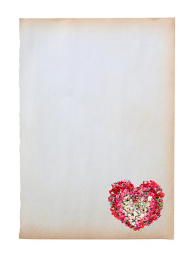 Old brown paper with image of heart roses flower isolated on white background