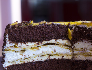 Cut banana cake with sprinkles and chocolate