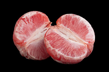 Orange grapefruit on black background