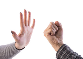 Woman making stop gesture, man showing fist on a white background. Stop the violence