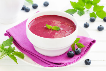 Desert- blueberry soup with cream.
