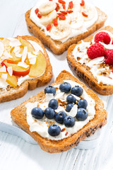 sweet toast with different toppings, vertical top view