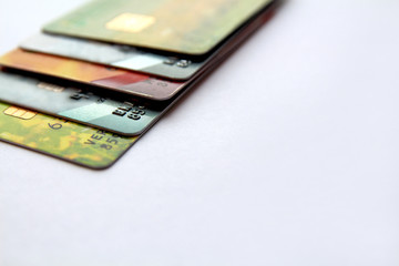 row of credit cards, close up view with selective focus. 
