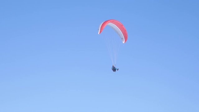 A para-glider landing after an enjoying flight...