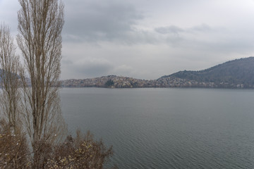 The picturesque city of Kastoria and the magnificent lake in the - 136313725