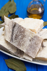 salted raw dry cod fish on dish