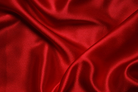 Red cloth waves background texture.