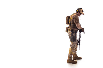 man military outfit a mercenary soldier in modern times on a white background in studio - obrazy, fototapety, plakaty