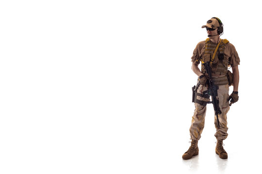 man military outfit a mercenary soldier in modern times on a white background in studio