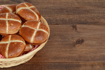 Fototapeta na wymiar closeup hot cross buns in basket