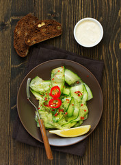 Cucumber salad with pepper and ginger. Diet food.