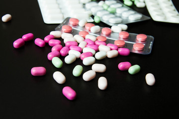 Blood pressure meter and stethoscope, on dark wooden background