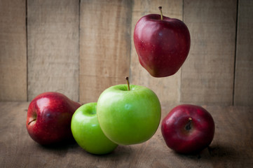 kitchen table with green and red apple  - healthy eating and healthy food concept.