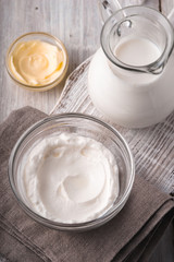 Dairy farm products on the white wooden table  top view