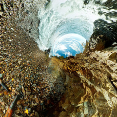 twisted wave pebbles and rocks beach Baikal