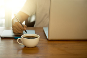 Businessman working with generic design notebook