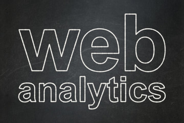 Web development concept: Web Analytics on chalkboard background