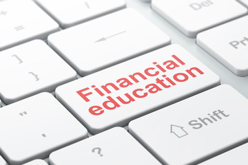 Studying concept: Financial Education on computer keyboard background