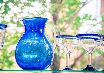 blue water jug and glasses 