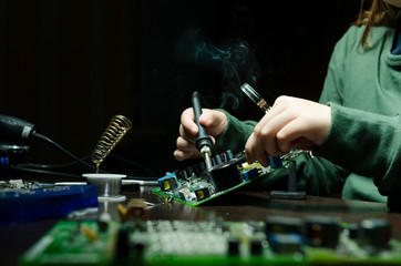 Repair of electronic devices, tin soldering parts. solderer