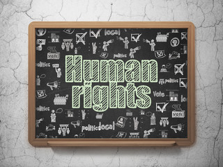 Political concept: Human Rights on School board background