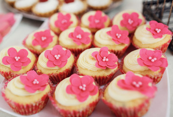 Sweet cakes with pink flowers