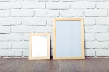 Picture frame on brick wall