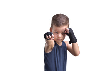 Little boy boxing, shows his fists, isolated on white