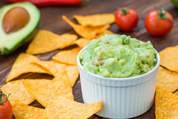 Delicious guacamole with crunchy nachos