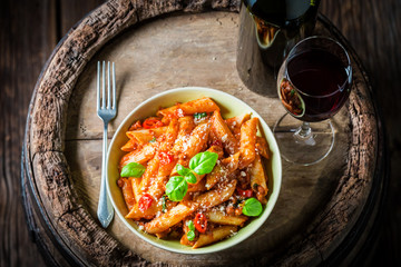Delicious penne bolognese with parmesan and red wine