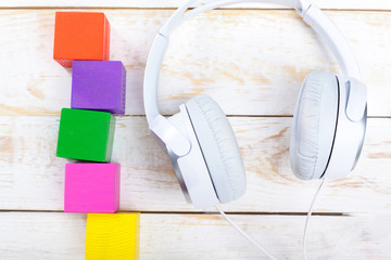 Headphones on wooden desk table