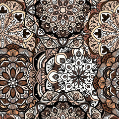 Seamless ethnic pattern with floral motives. Mandala stylized print template for fabric and paper. Indian or Arabic motive. Boho festival style.
