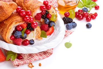 Fresh croissants and honey.