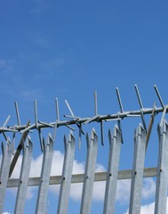 Fototapeta na wymiar Security fence, metal, spiral