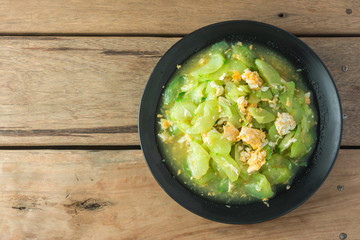 Stir Fried Cucumber on wooden table.