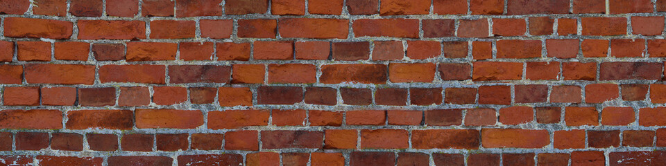 panorama brick wall orange masonry uneven wide and narrow stone