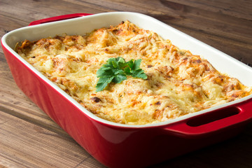 Homemade Meat lasagna on wooden table