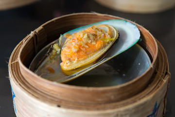 Mussel dimsum (chinese food) in bamboo basket