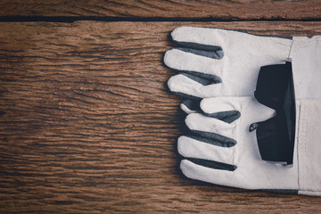 Safety equipment on wooden background