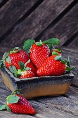 Strawberry on the wooden background 